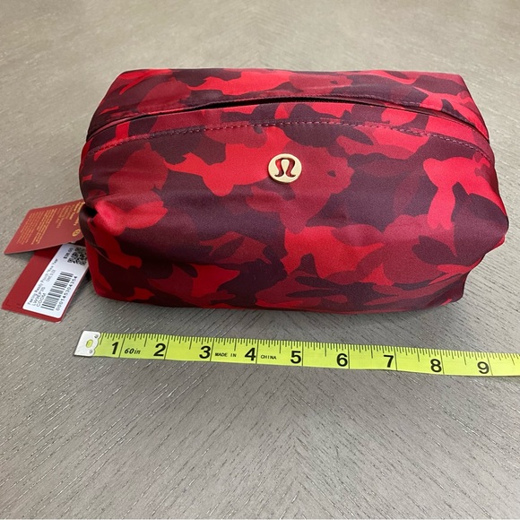 SOLD! Lululemon Athletica New Year Feeling Ready Mini Zip Pouch Red Camouflage - Picture 2 of 16